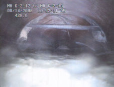 The inside of a sewer pipeline shown by the CCTV camera.